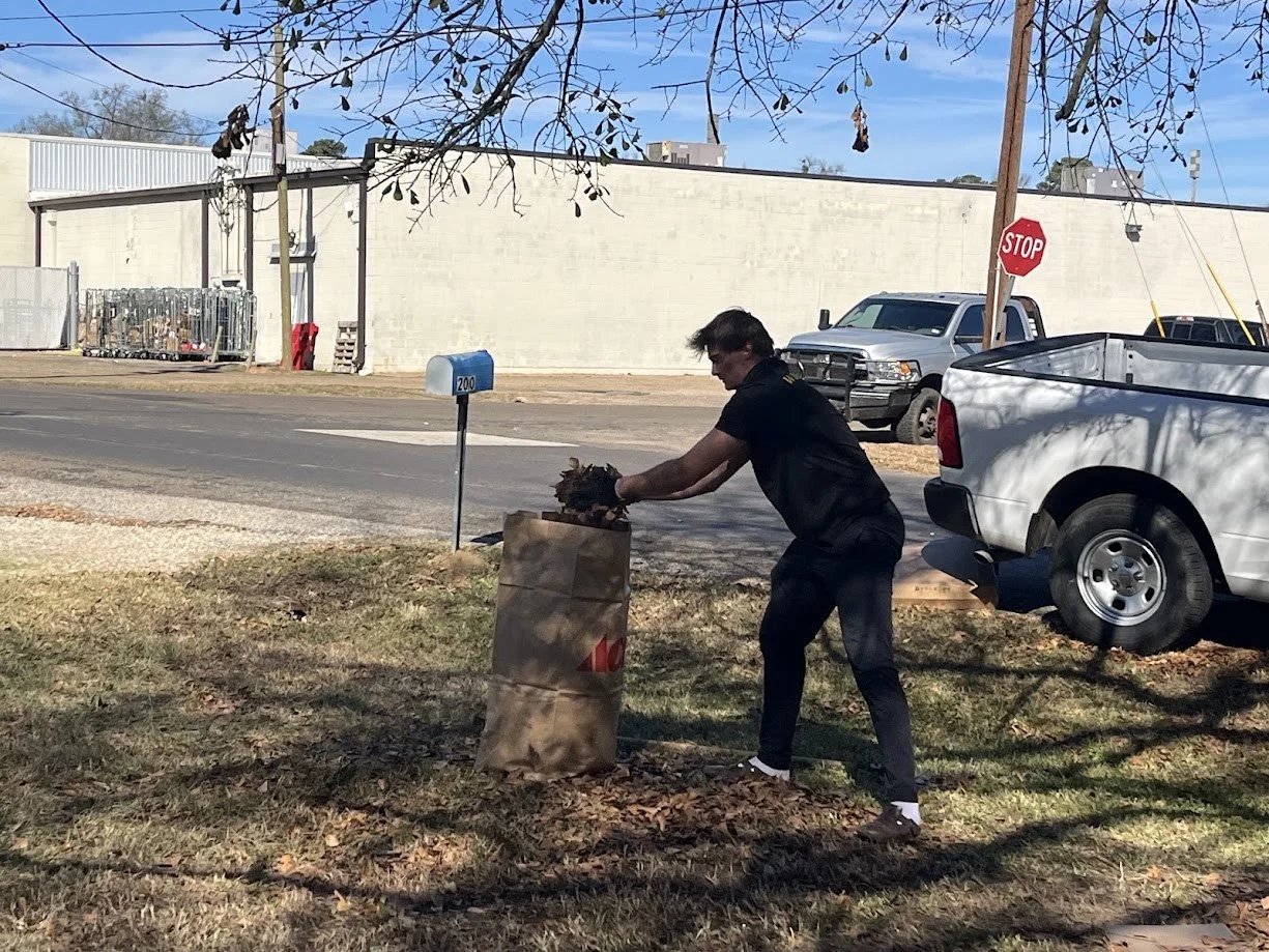 Connect Longview volunteers from LeTourneau University baseball team at a workday